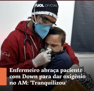 Enfermeiro abraça criança com Síndrome de Down para lhe dar oxigênio no Amazonas, UOL