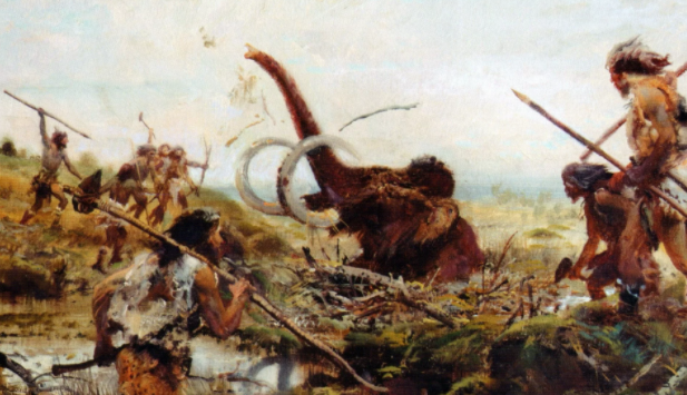homens pré-históricos caçando em grupo